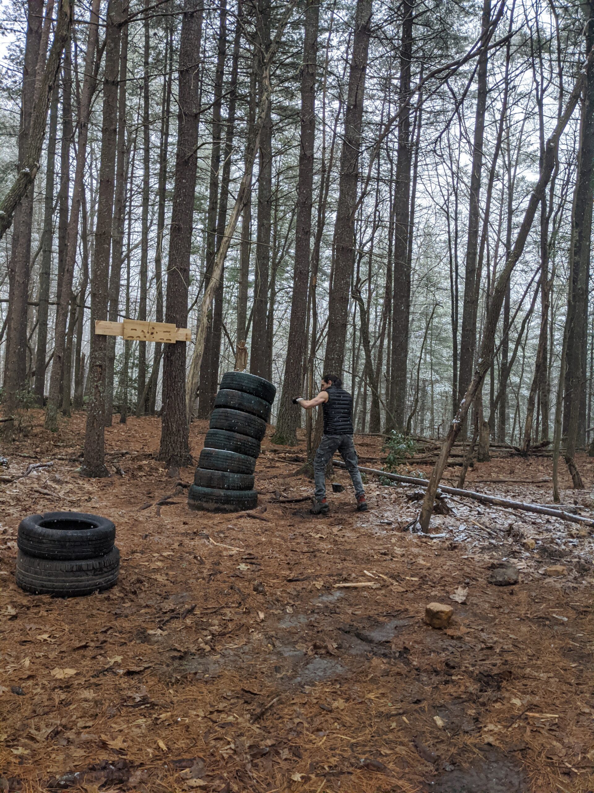 Striking a stack of tires in the woods